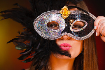 Sensual woman with carnival mask.