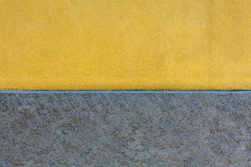Fototapeta premium Yellow and gray wall for background 
