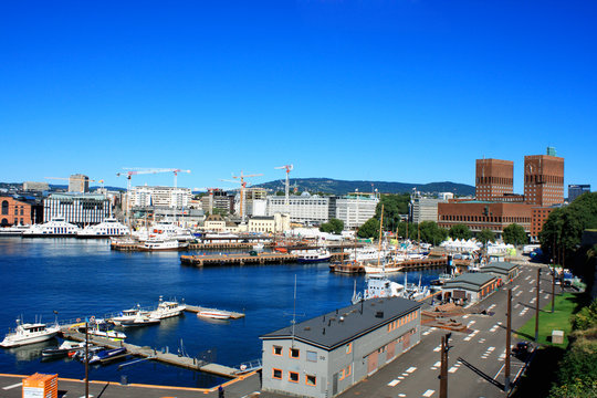 View on modern district Stranden, Aker Brygge district with lux buildings in Oslo, Norway