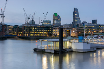 Fototapeta premium LONDON, ENGLAND - JUNE 17 2016: Night Photo of Thames River and skyscrapers, London, Great Britain