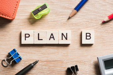 Conceptual business keywords on table with elements of game making crossword