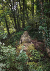 Statue of Zeus in the folies forest of Parc Mondo Verde.