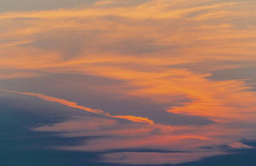 Beautiful sunset with dramatic clouds on the sky