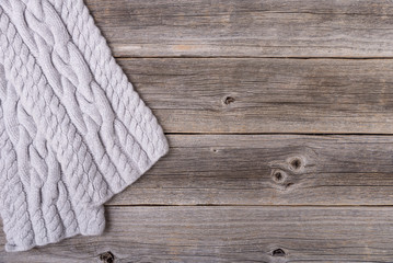 Scarf on wooden boards.