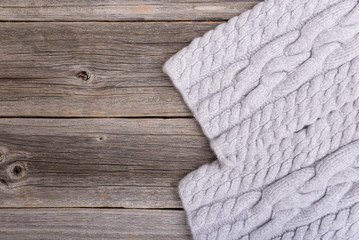 Scarf on wooden boards.