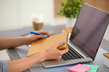 Fototapeta premium Designer working at desk using digitizer in his office