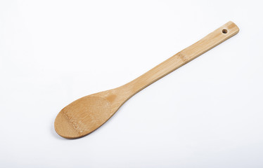 Wooden spoon on white background. Isolated.
