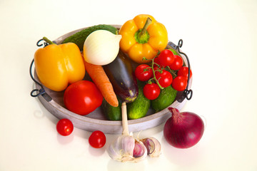 Composition with assorted raw organic vegetables on table