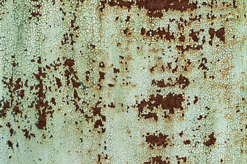 Rusty metal with the paint peeled, old metal corroded surface. Old texture for backgrounds.