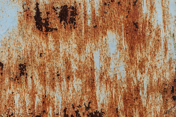 Corroded white metal background. Rusty metal background with streaks of rust. Rust stains. The metal surface rusted spots. Rysty corrosion.