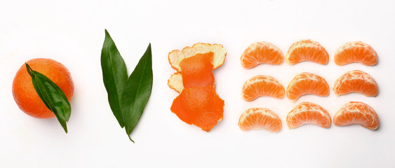 Gradual peeling of tangerine on white background.