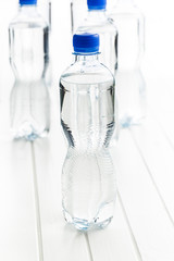 Small plastic water bottle.