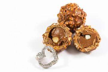 chocolate bean / Chocolate Candy, Truffle with heart pendant  Valentine day concept isolated on white background.