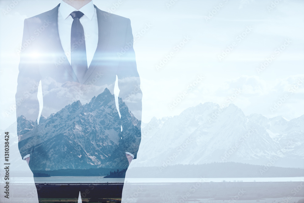 Poster businessman on mountains background multiexposure