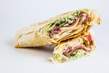 Healthy lunch snack.  Grilled wraps on white.