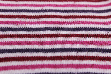 Texture knit multi-colored striped fabric.