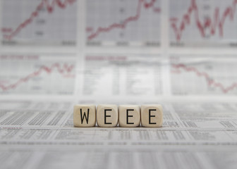 WEEE word built with letter cubes