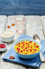 Turmeric quinoa with pomegranate and walnuts