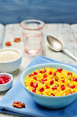 Turmeric quinoa with pomegranate and walnuts