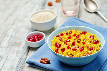 Turmeric quinoa with pomegranate and walnuts