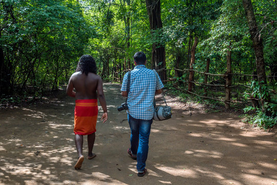Vedda man and tourist