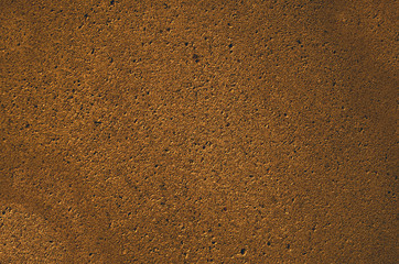 fragment of stone surface,natural camstone or artificial stone cover toned brown