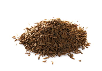 Pile of cumin seeds isolated on white background