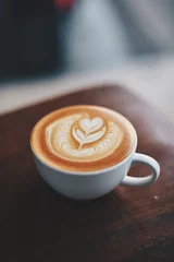Zelfklevend Fotobehang coffee latte in coffee shop cafe   © chayathon2000
