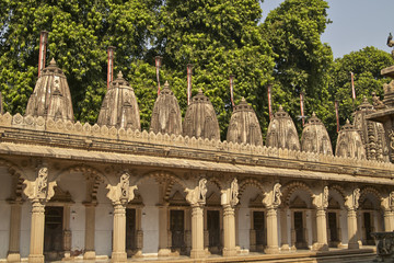 Ornately carved stonework of a colonnade surrounding the courtyard of the Hutheesing Temple in Ahmadabad, Gujarat, India. Jain temple built circa 1848.