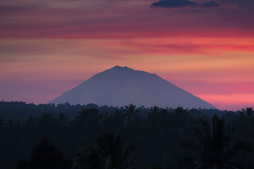 Mt. Batukaru. Gunung Batukaru, sometimes spelled Batukau, is Bali's second-highest mountain at 2,276 m. It is the highest peak in the Bedugul volcanic area, but is dormant. Photographed at sunrise.