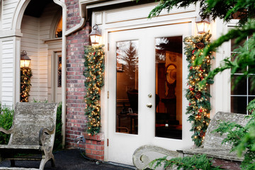 Outdoor Christmas decorations on porch and patio