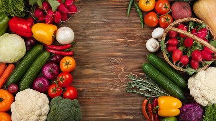 Fresh vegetables on wooden background