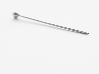 pins on white underground