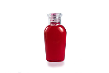 The small shampoo bottle as red liquid inside isolated on white background,Front,Isometric