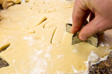 Making cookies with a star cookie cutter