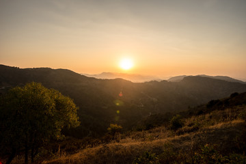 Obraz premium Zachód słońca w górach Troodos