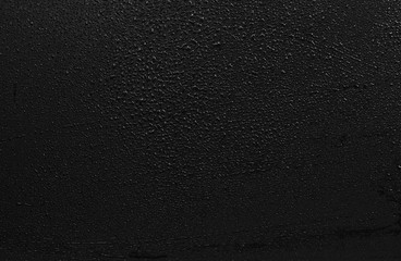 Drops of water on a blackboard