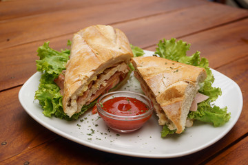 served panini in wood table