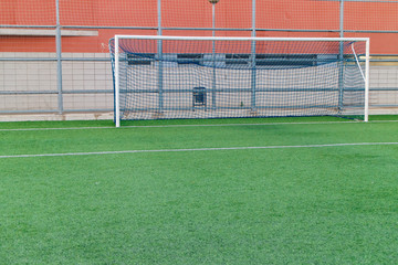 football amateur stadium with green grass