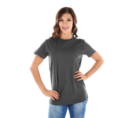 Obraz premium Young woman in blank grey t-shirt on white background
