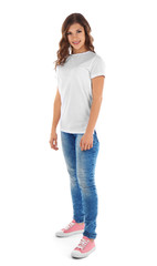 Fototapeta premium Young woman in blank t-shirt on white background