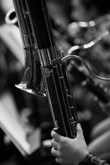 Detail of contrabassoon in the orchestra closeup in black and white
