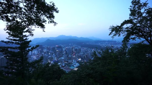 Seoul, South Korean capital city view from top of mountain during sunset evening time