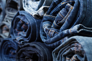 Different folded jeans closeup