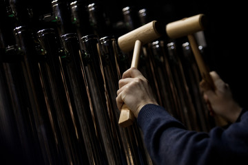 Hands musician playing the orchestral bells closeup