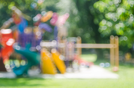 Blur colorful playground in nature green park abstract background.