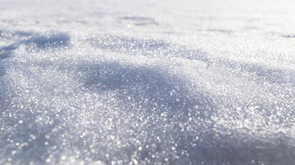 Close up of melting ice in the spring sun. Winter snow texture