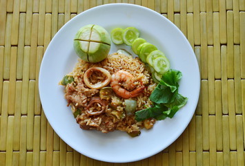 spicy fried rice seafood and pork with eggplant in shrimp paste sauce on dish