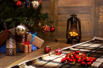 christmas gift and objects under fir tree