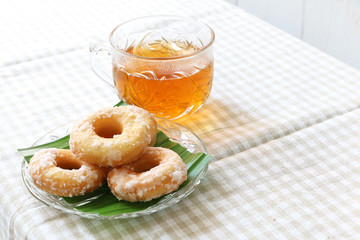 Malaysian traditional Fried donuts coated with icing sugar
